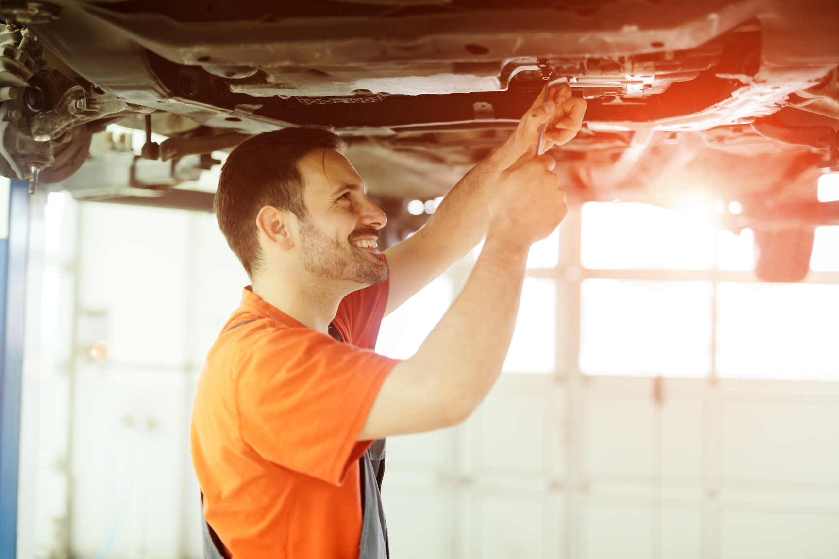 Car mechanic fixing a car