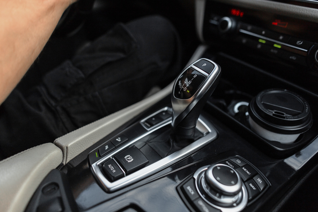 Car interior. Transmission is automatic.